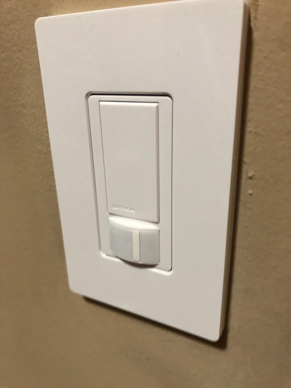 motion sensor covered with white tape